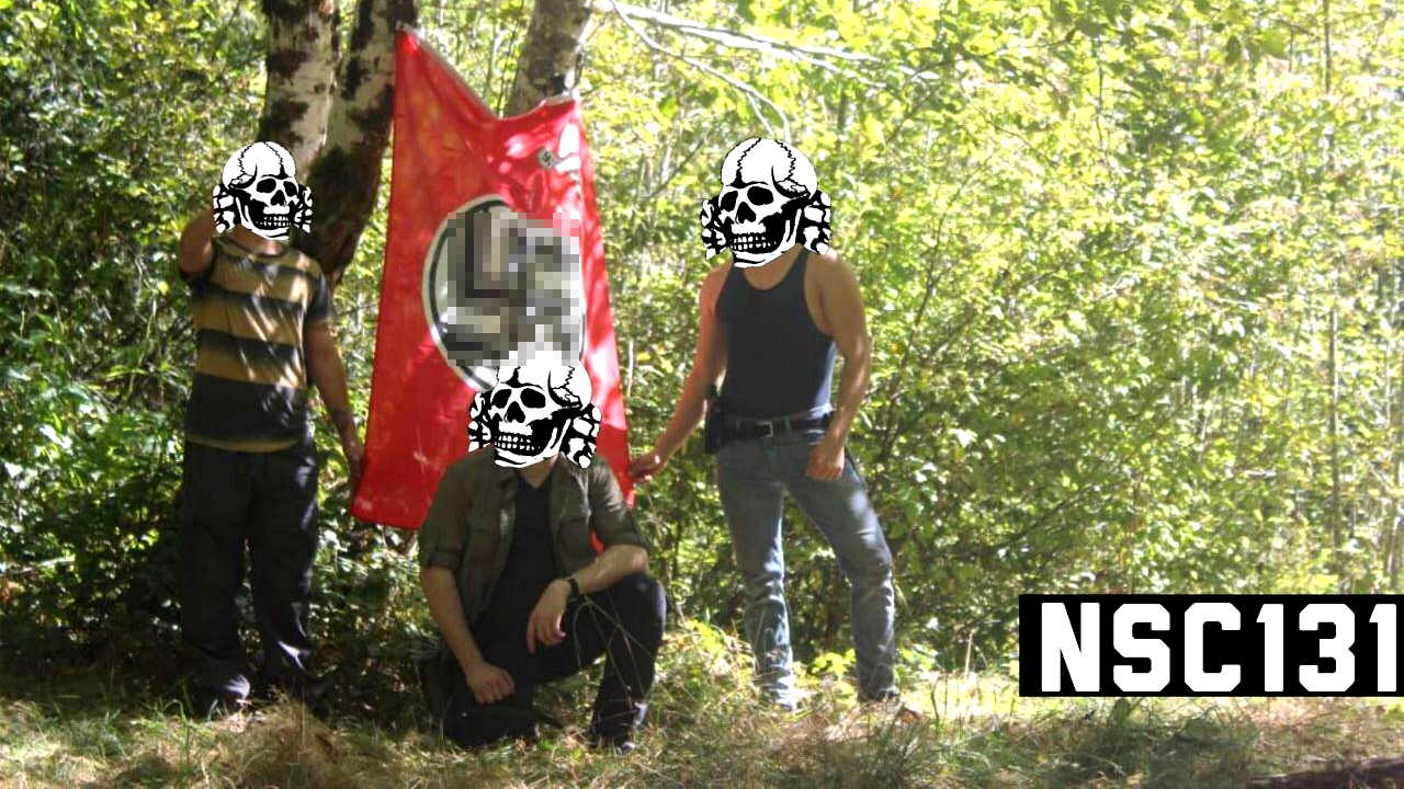 The international, far-right terrorist group “NSC 131” communicates on Telegram. Here, members pose with a swastika flag in the woods. (The editors have decided to blur the swastikas.)
